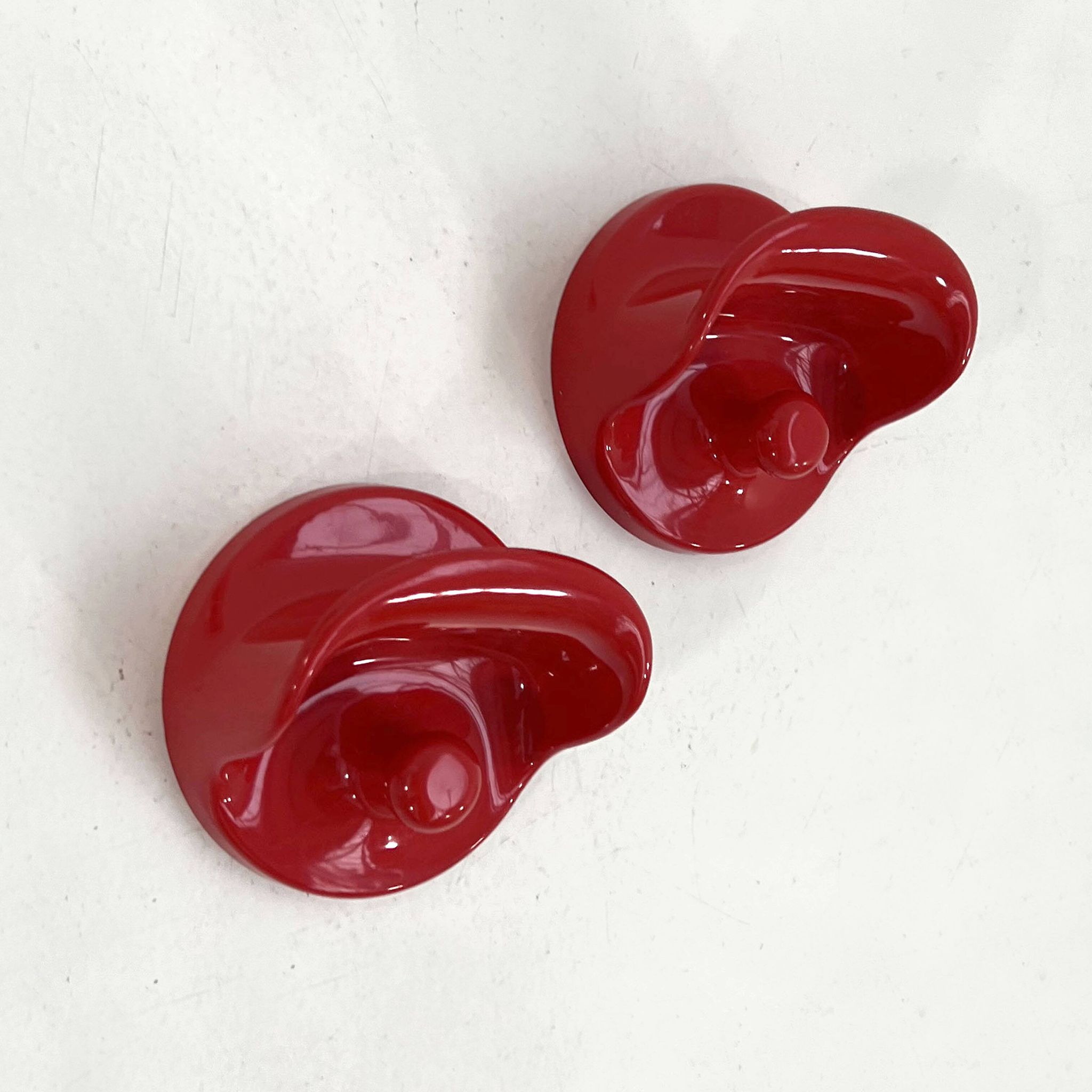 Set of 2 red "gancio 4702" coat hooks by olaf von bohr for kartell, 1970.
