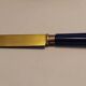 Antique cake service in metal and blue bakelite
