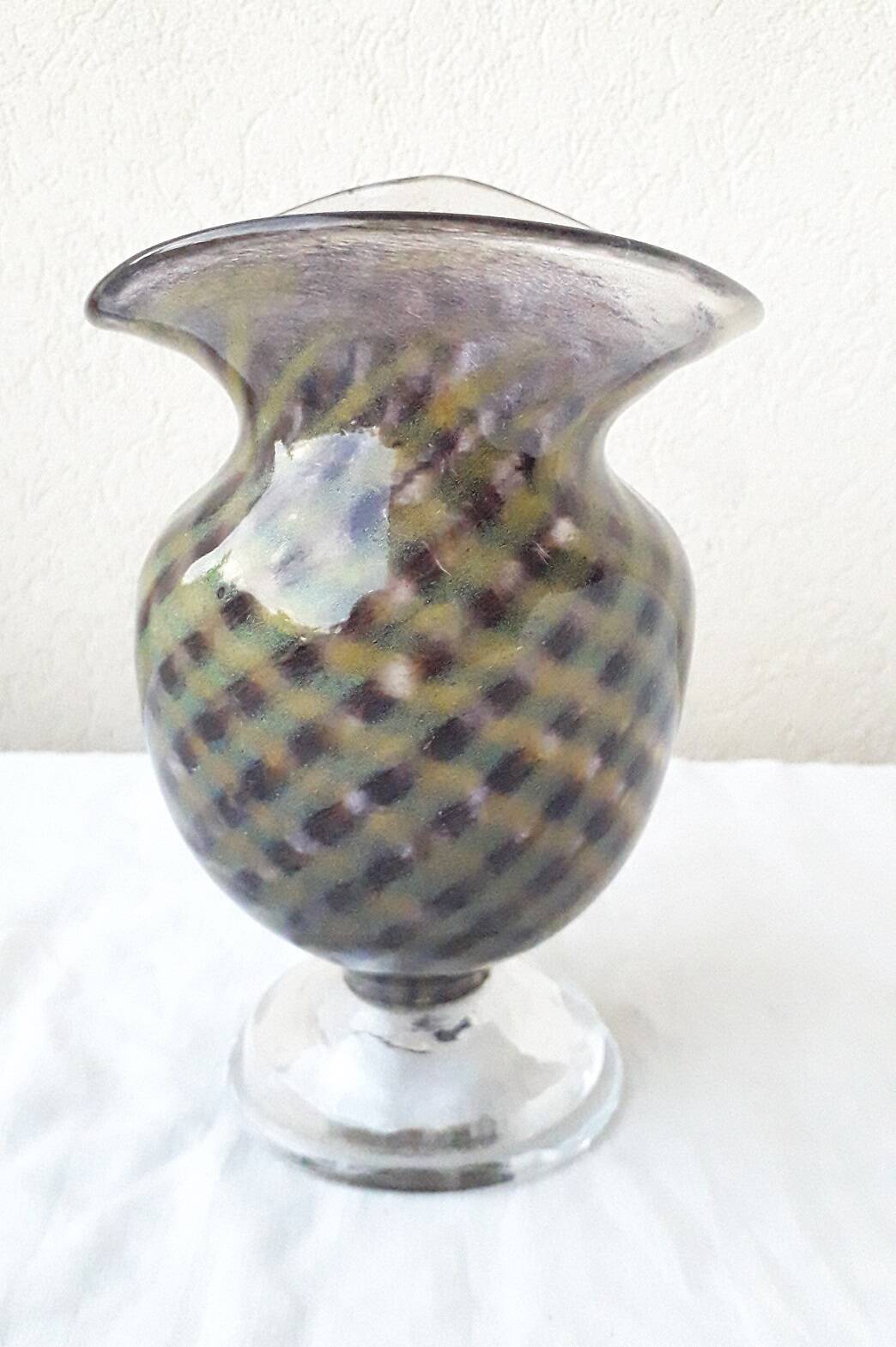 Glass vase on a stand