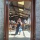Large trumeau mirror with carved wood in the Louis XVI / Henri II style, 19th century.