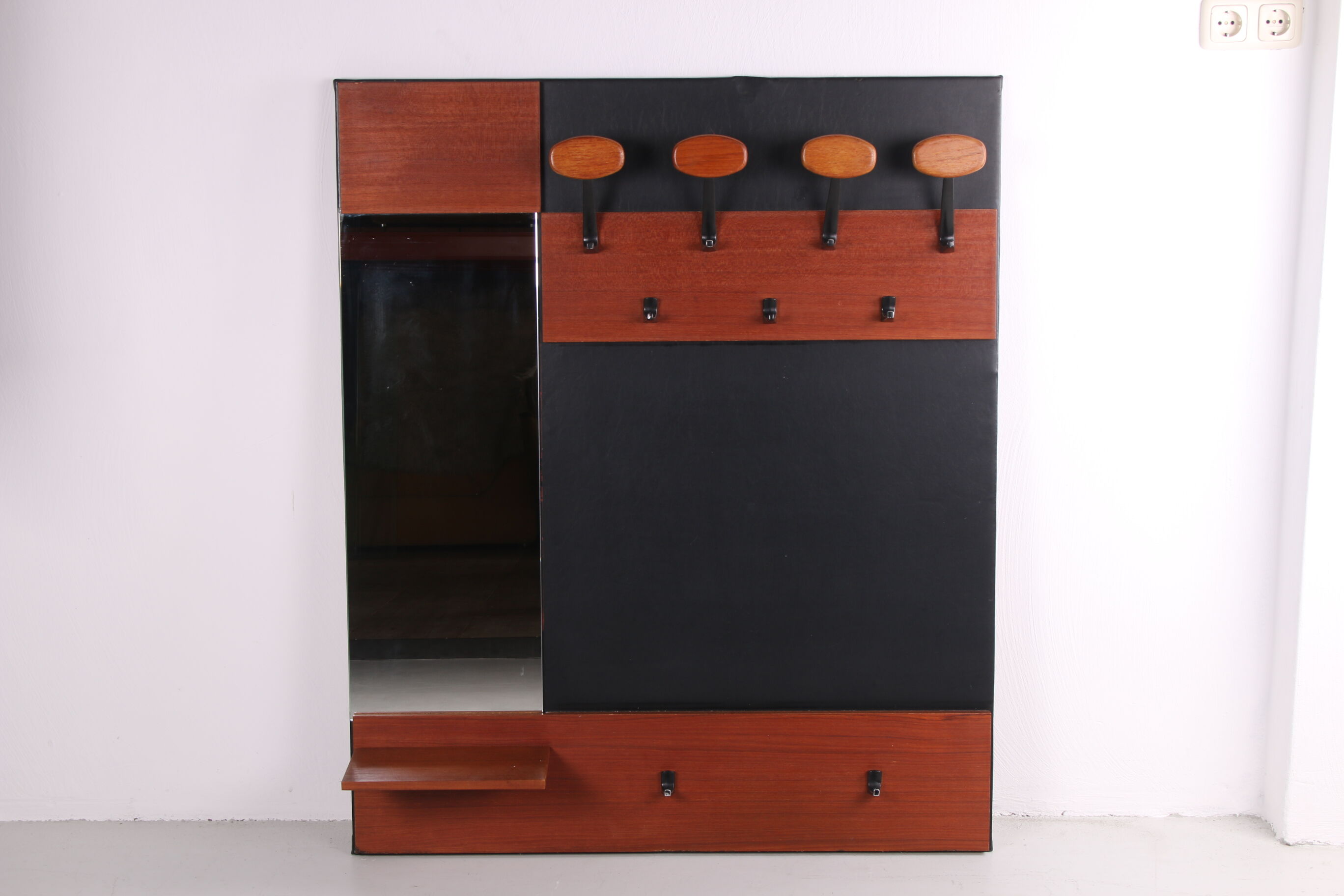 Vintage wardrobe with mirror and hooks from the 60s