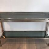 Beautiful console table in brushed metal with bluish glass shelves