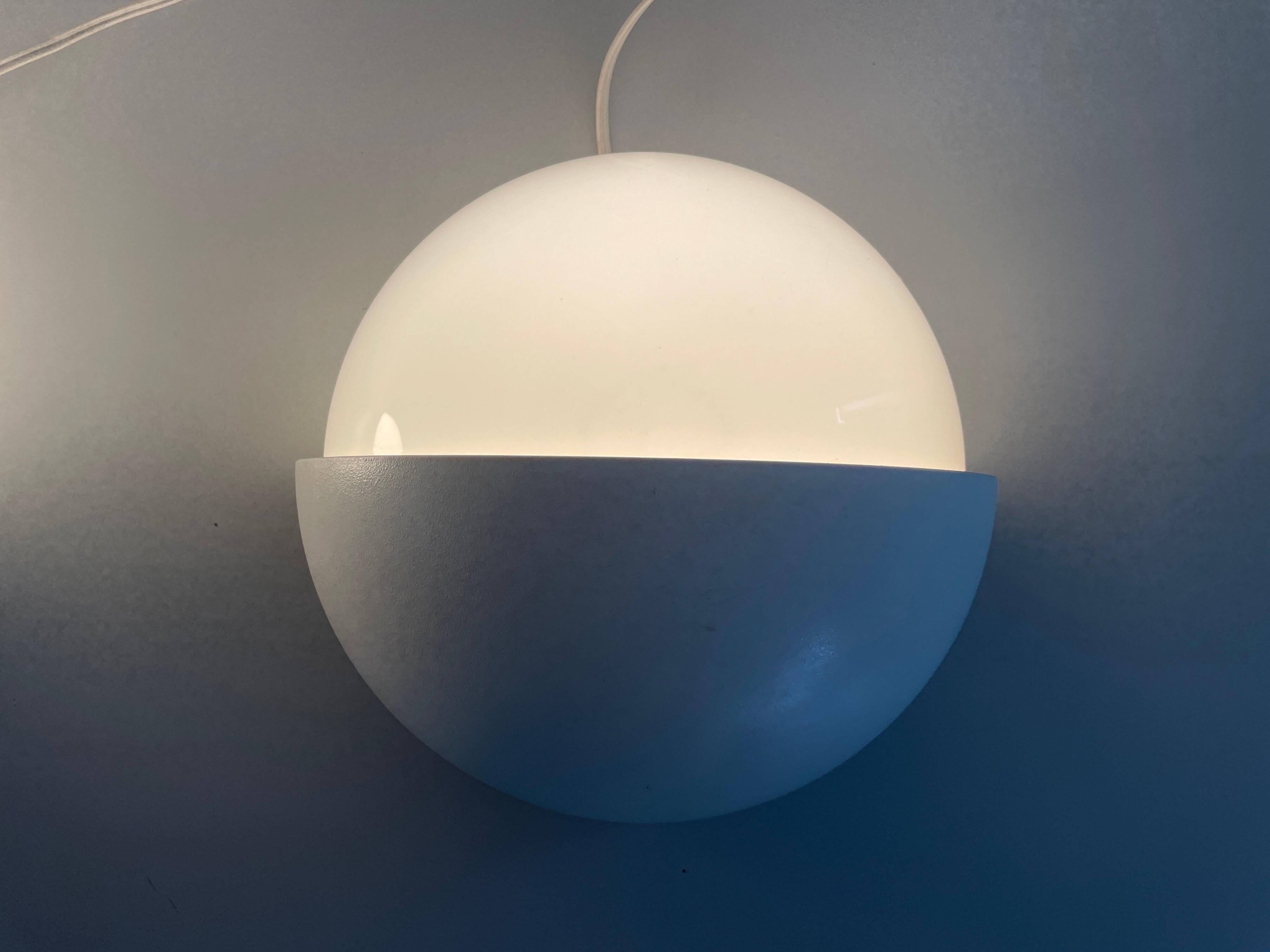 Round wall lights, small and large, in white metal by Bega, 1970s, Germany.