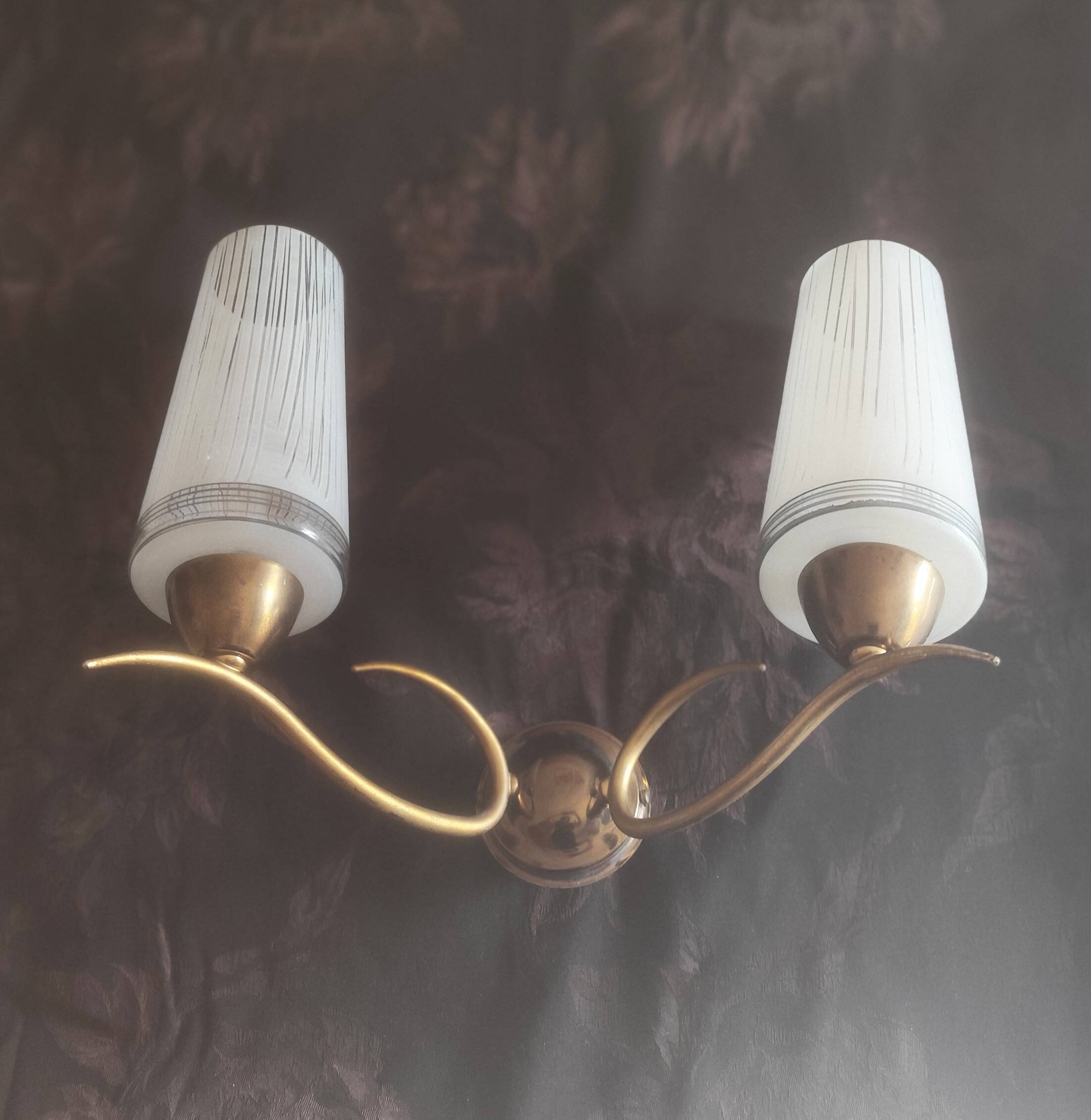 Two-light wall sconce in gilded metal with opaque glass shades, 1950/1960