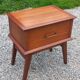 Vintage bedside table with compass legs from the 50s