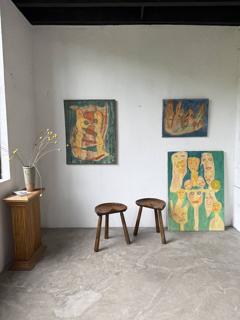 Pair of Le Selou tripod shepherd's stools