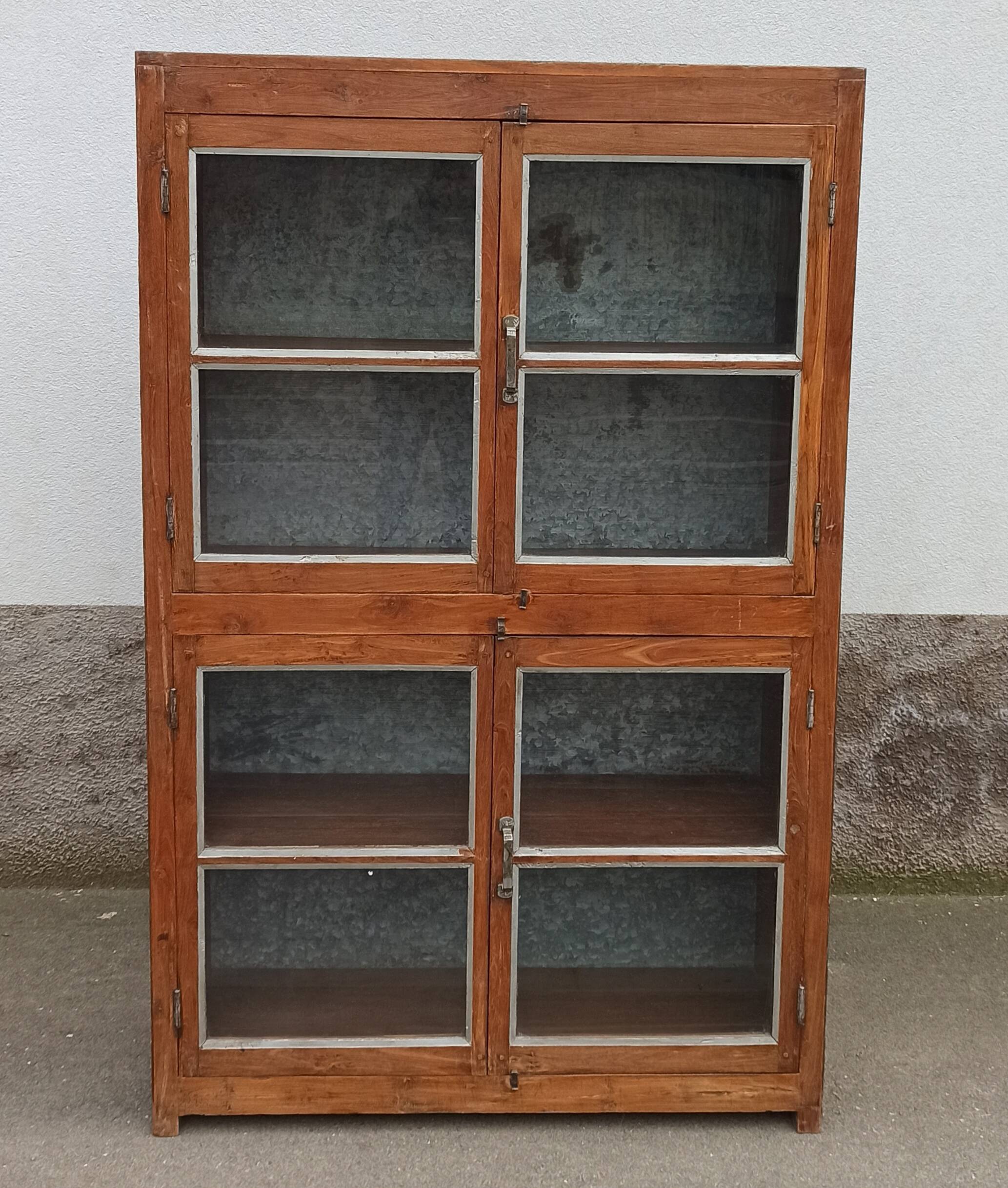 Old glass cabinet in wood and metal