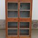 Old glass cabinet in wood and metal
