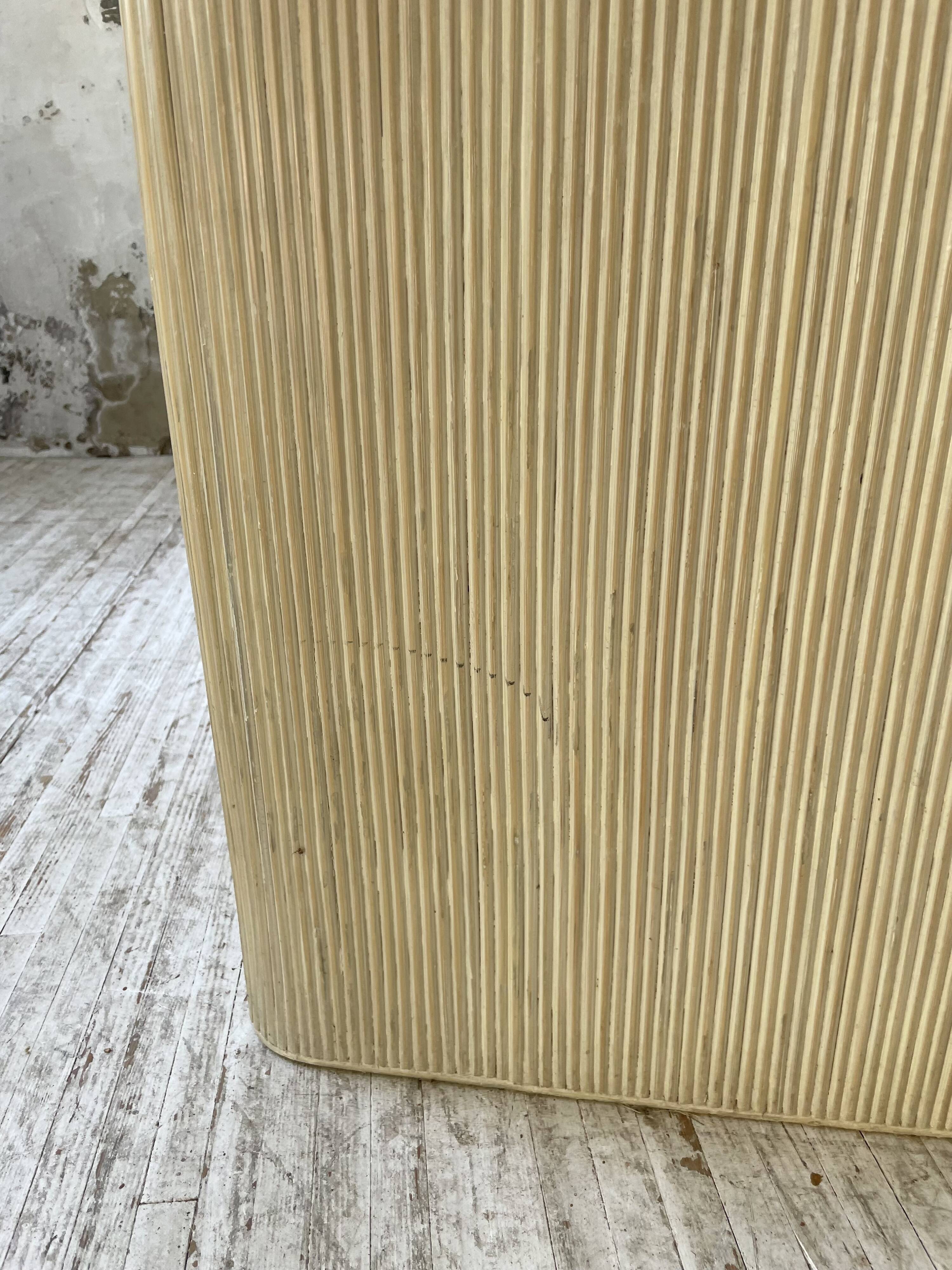 70s console in tropicalist rattan