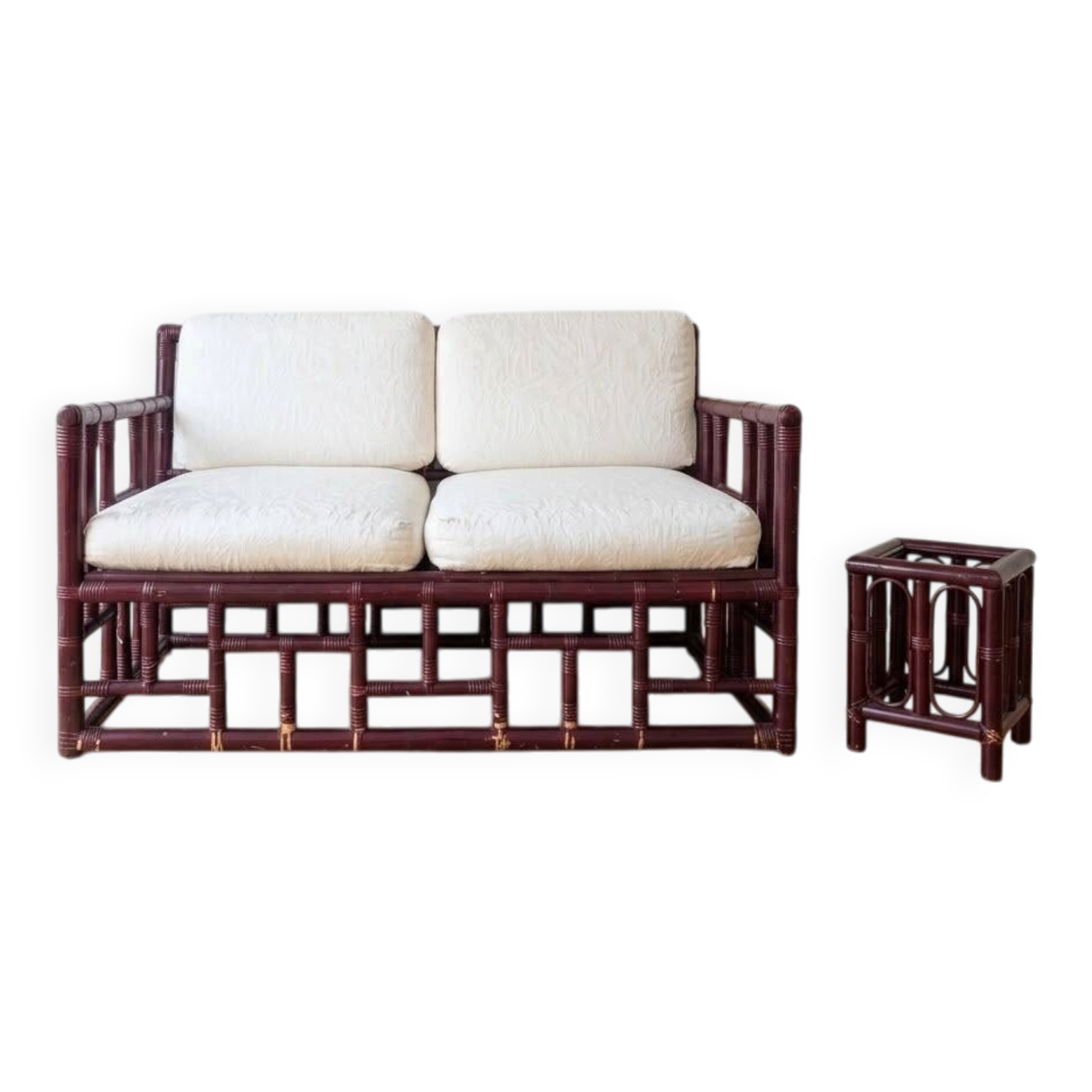 Two-seater sofa set and small lacquered violet rattan table.