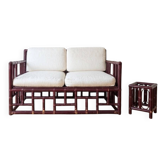Two-seater sofa set and small lacquered violet rattan table.