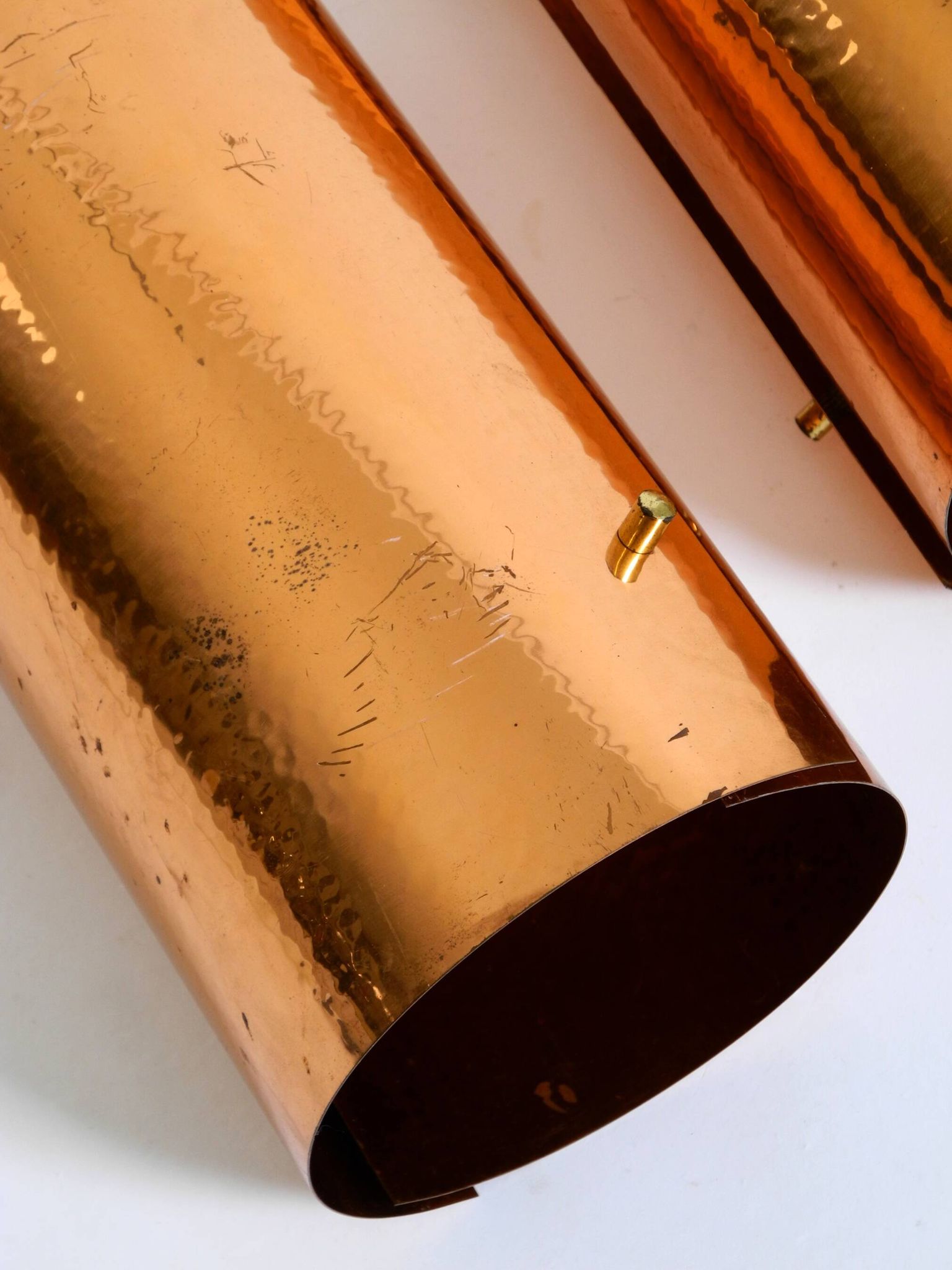 Two 50s tube pendant lamps consisting of two screwed-together copper bowls