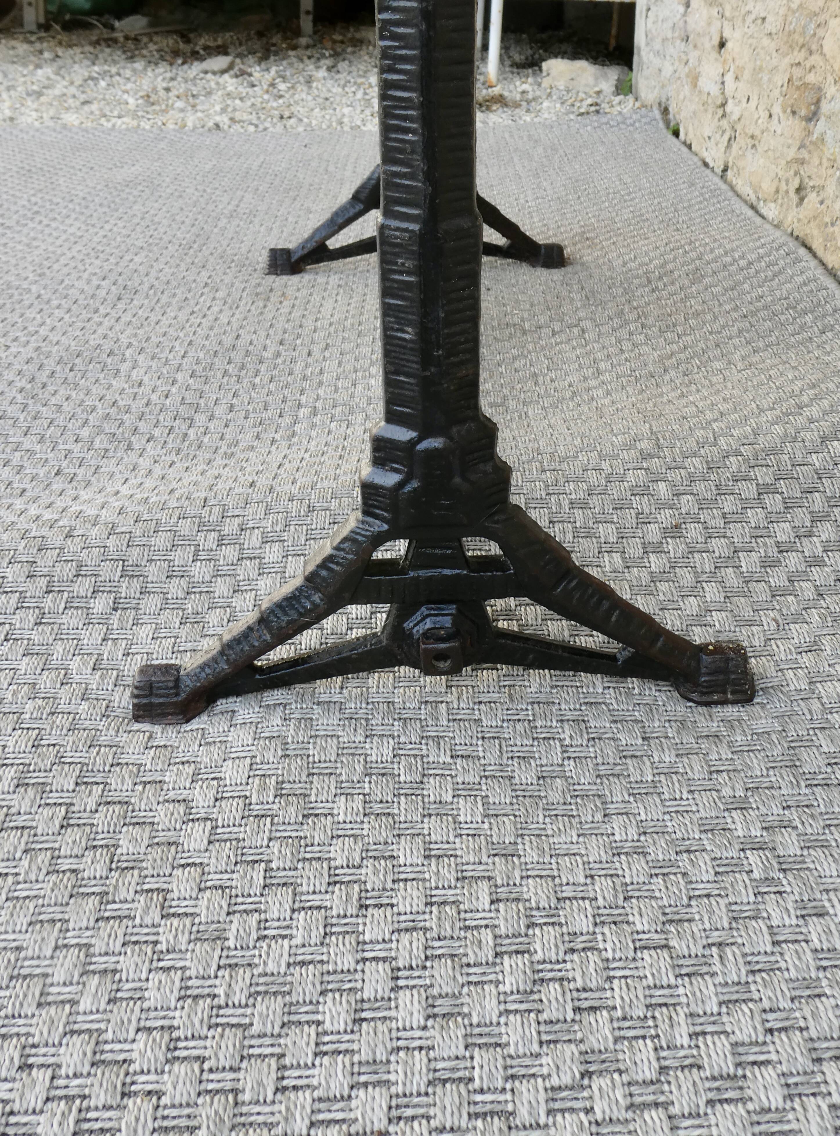 bistro table with cast iron legs signed Lelong, early 20th century
