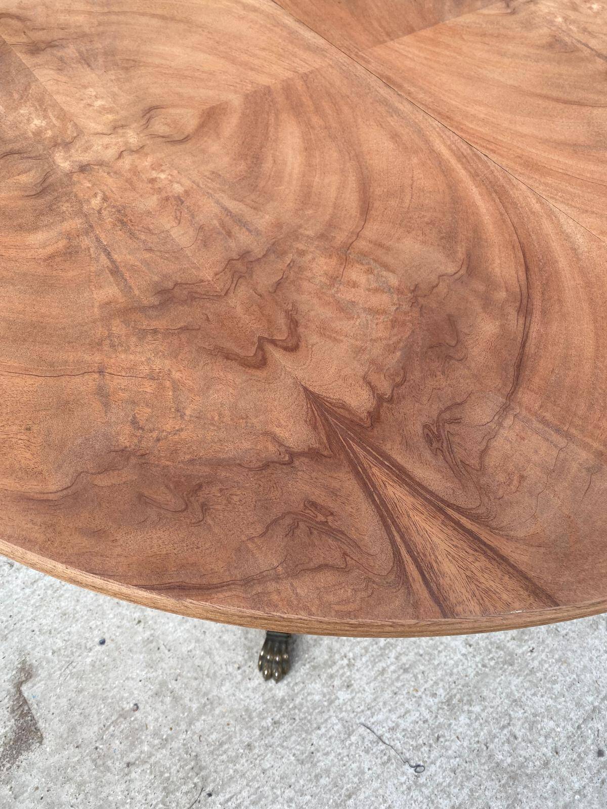 Extendable round dining table with central leg renovated in raw wood 205cm
