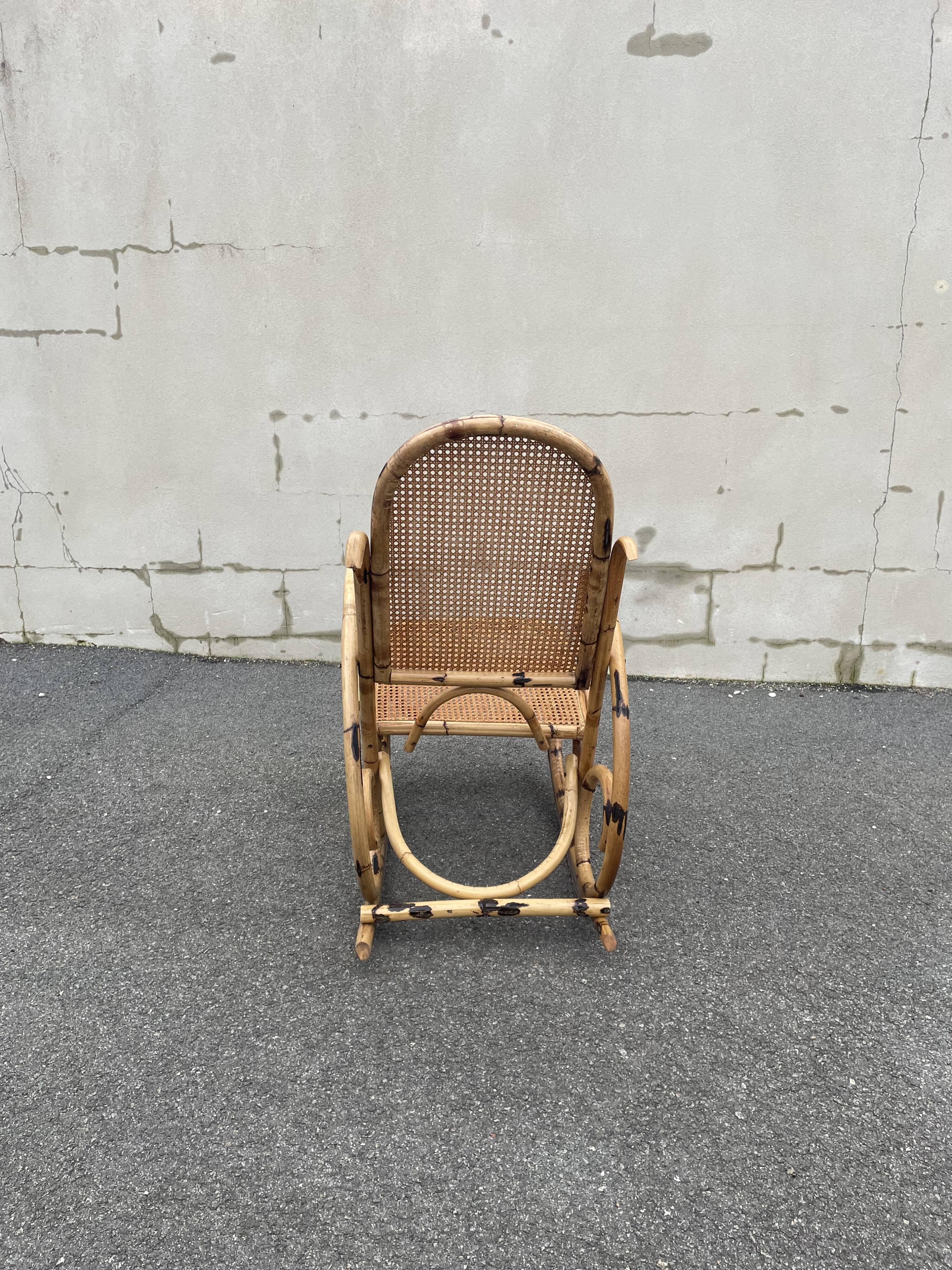 Rattan and cane rocking chair