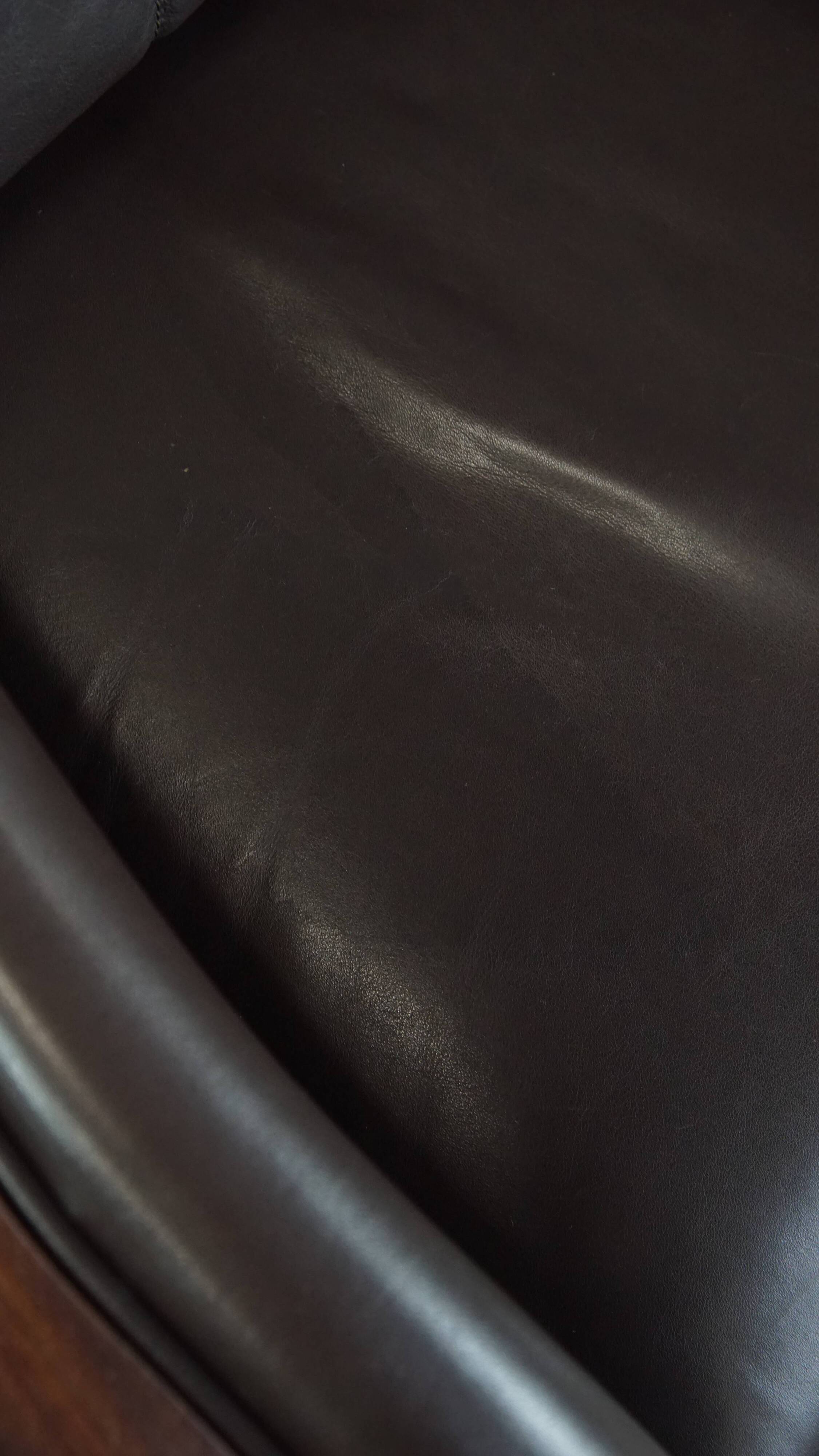 Art Deco armchair with dark brown leather