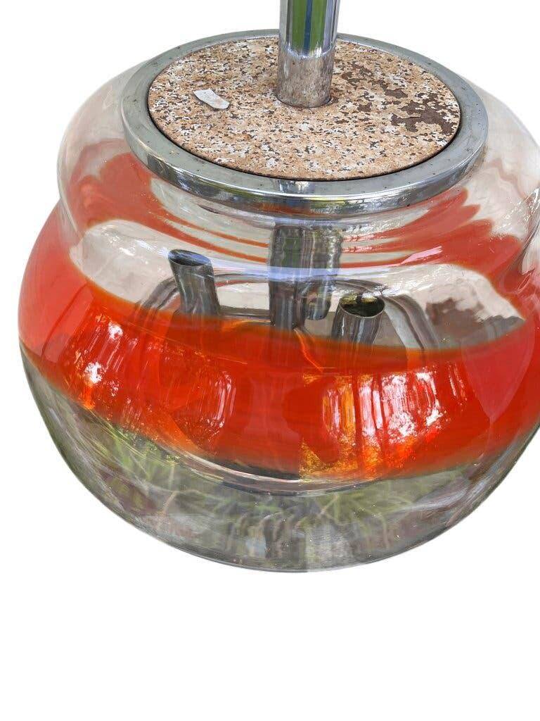 Vintage Murano glass pendant light with orange accent.