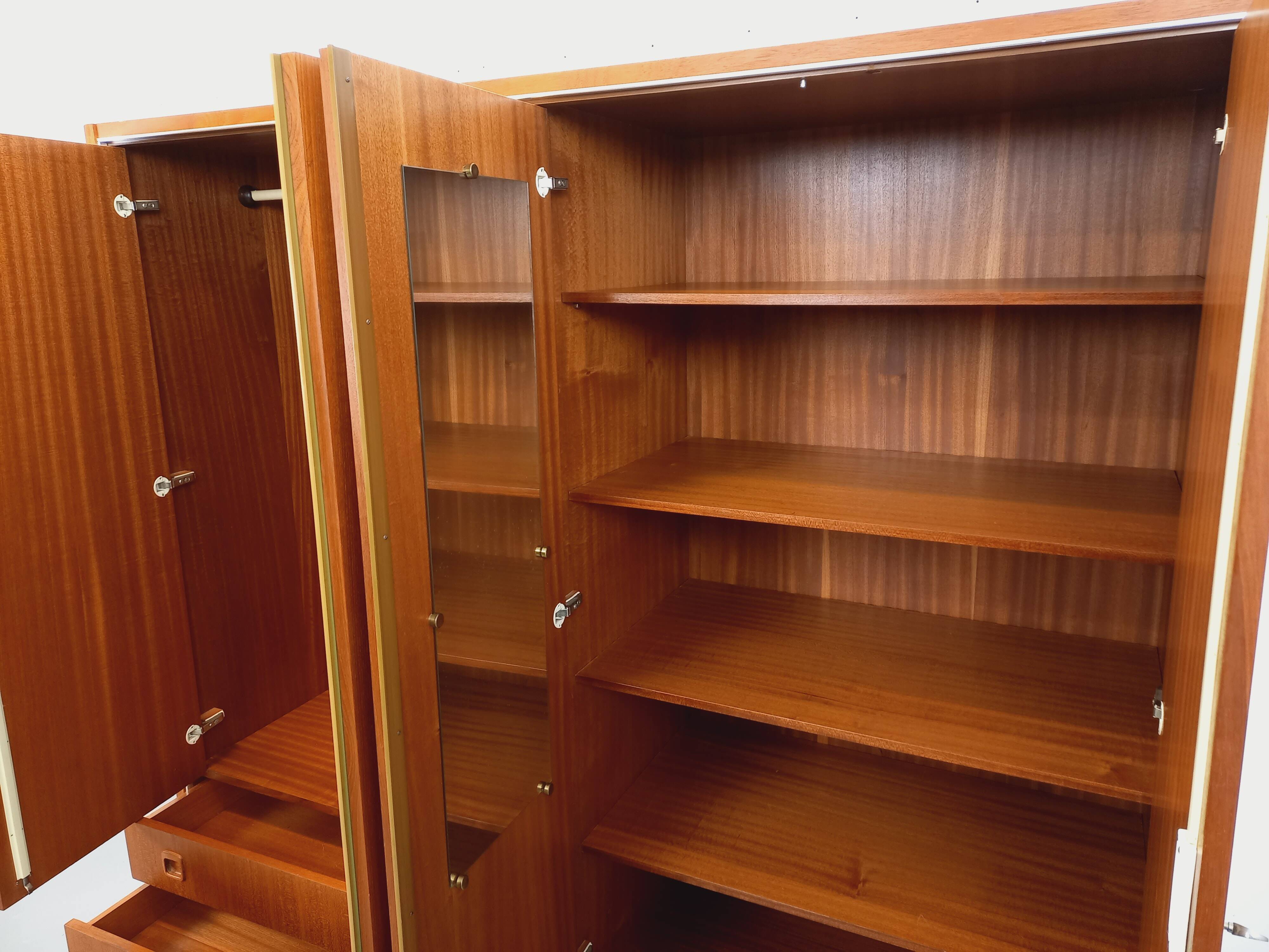 Vintage Scandinavian modernist wardrobe in teak and metal from the 1960s.