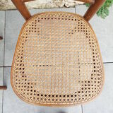 2 bistro chairs seated tanned