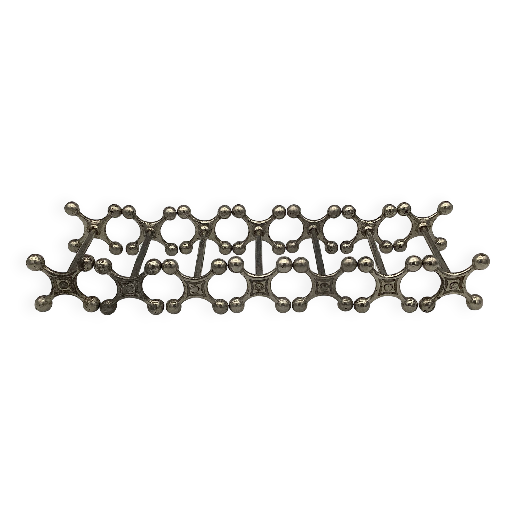 Set of 7 vintage knife rests in the shape of crosses in silver-plated metal.