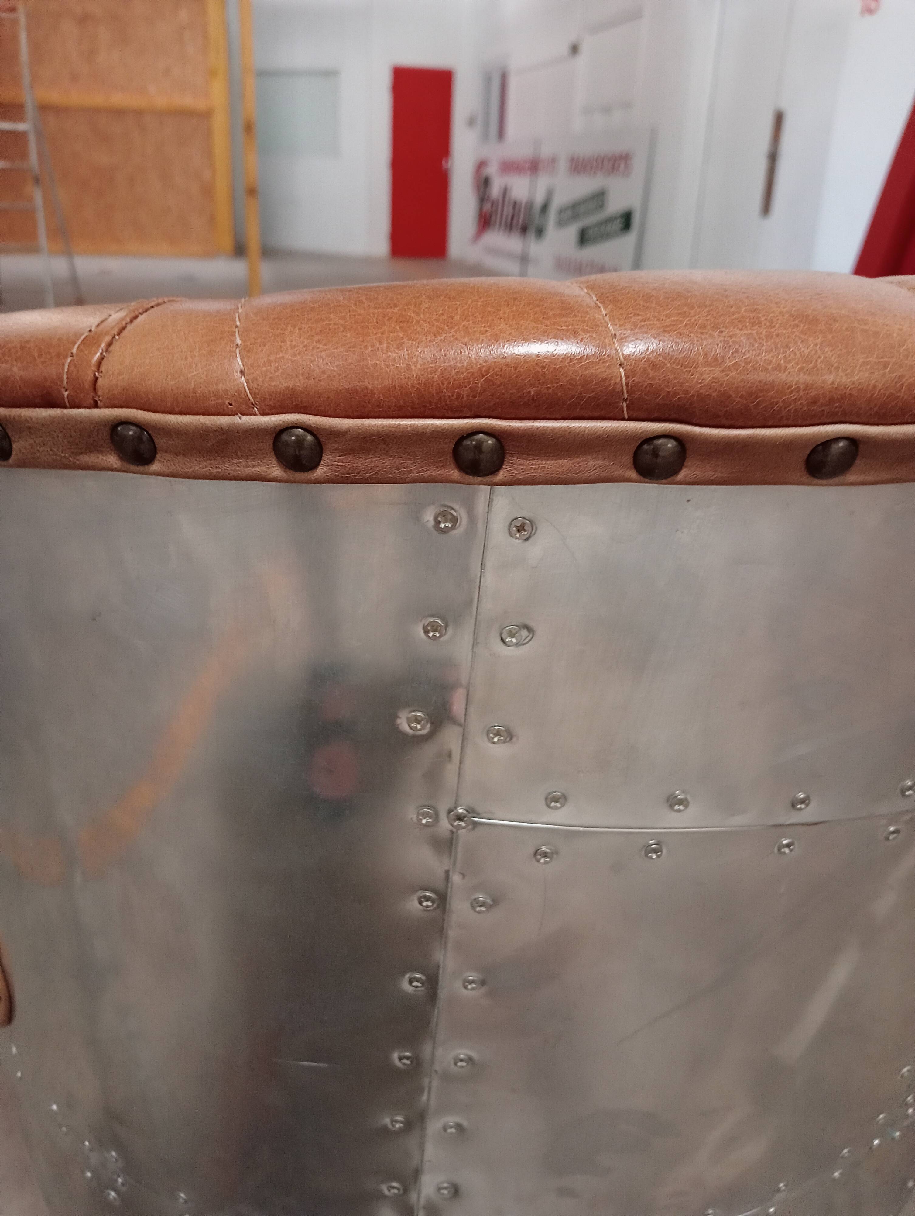 2 aviator armchairs