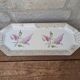 Limoges enamel porcelain cake dish LF with lilac flower decoration.