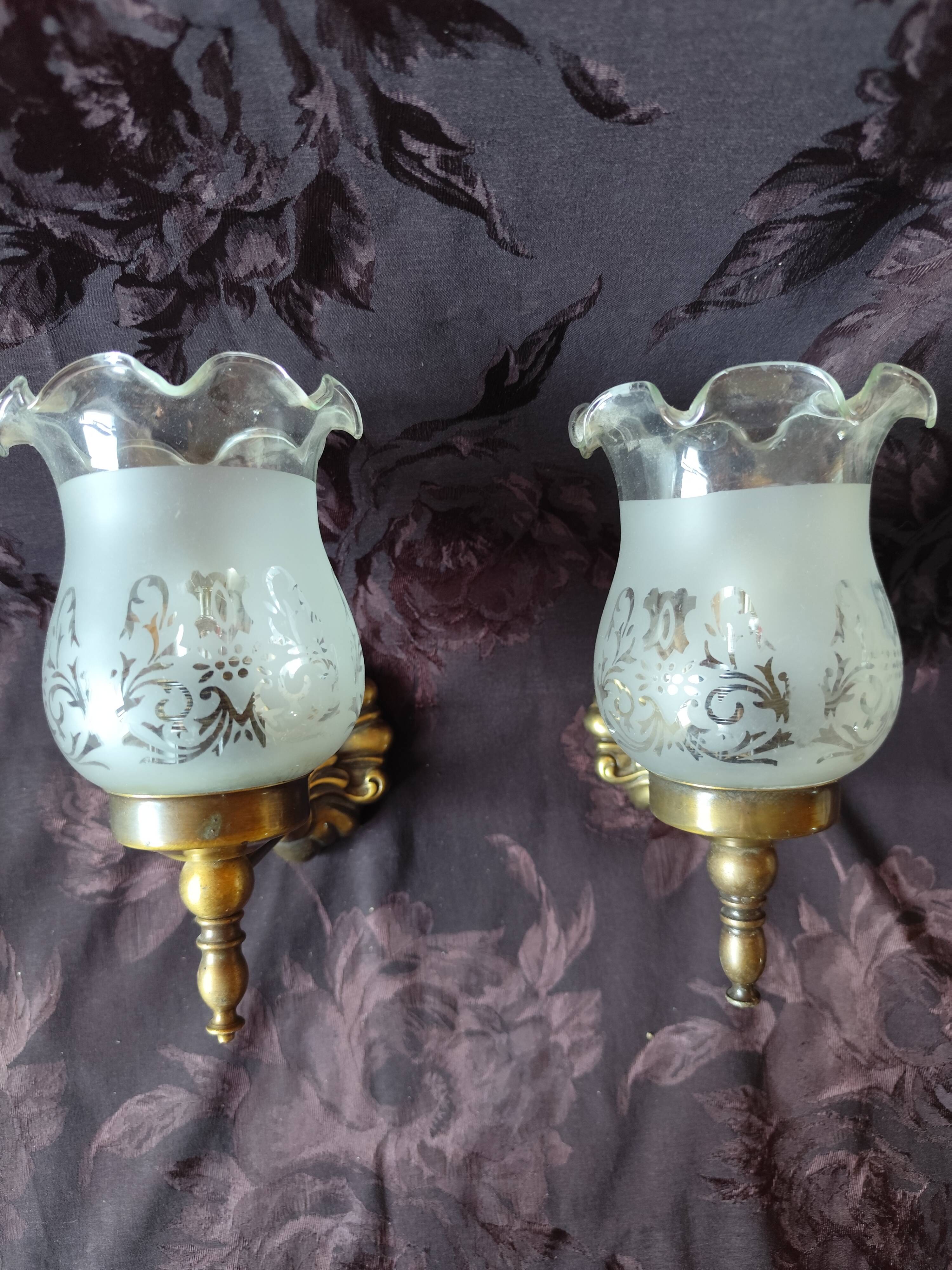 Pair of wall sconces in bronze with opaline glass tulips.