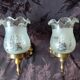 Pair of wall sconces in bronze with opaline glass tulips.