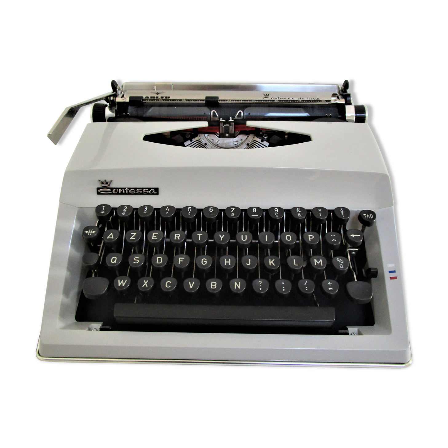 Writers' typewriters of light grey 70s Adler made in Holland