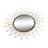 Sun mirror in gilded metal