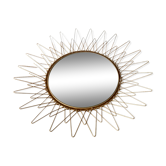 Sun mirror in gilded metal