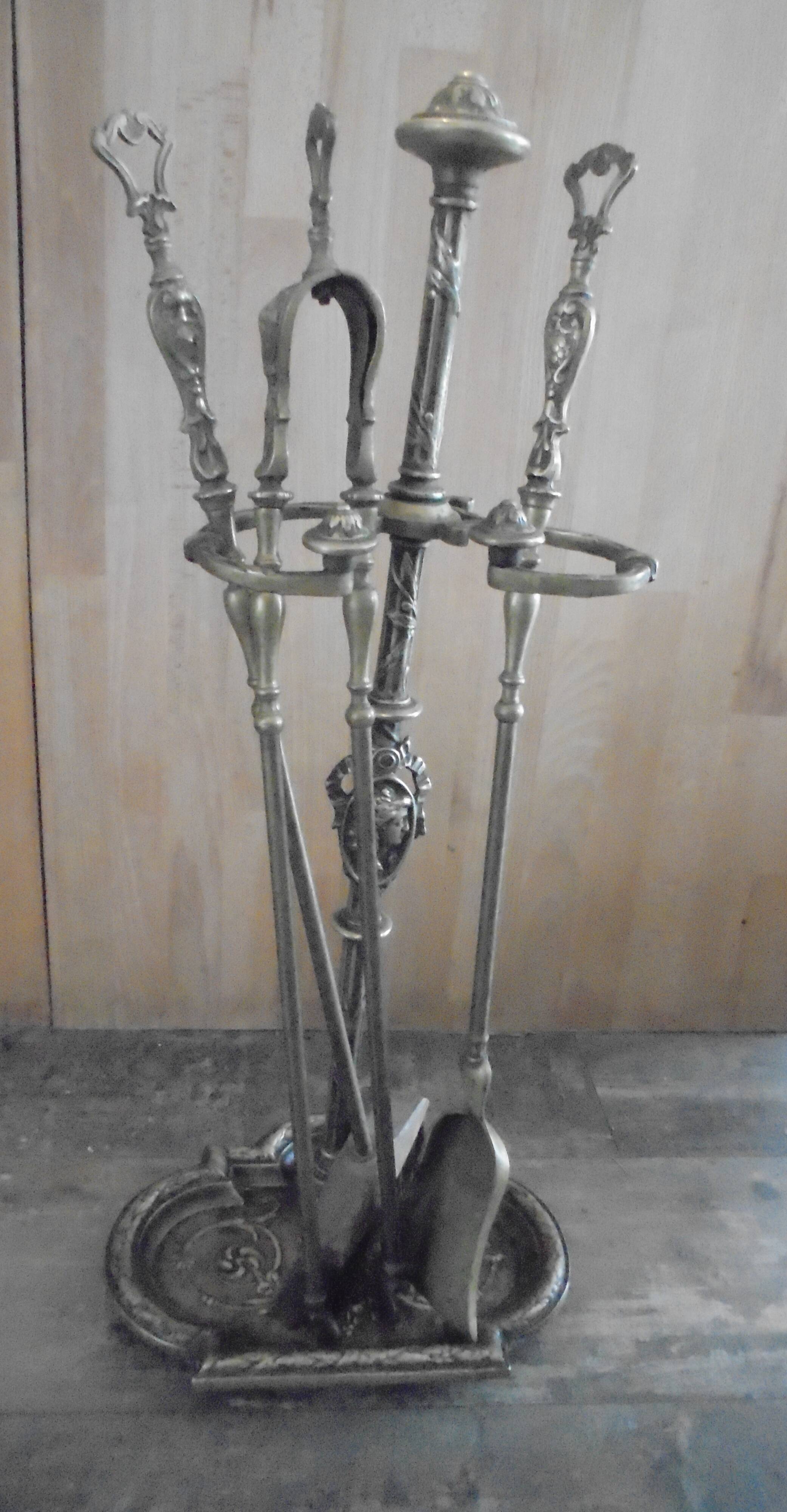 Old bronze fireplace servant decor medallion shovel clamp brooms