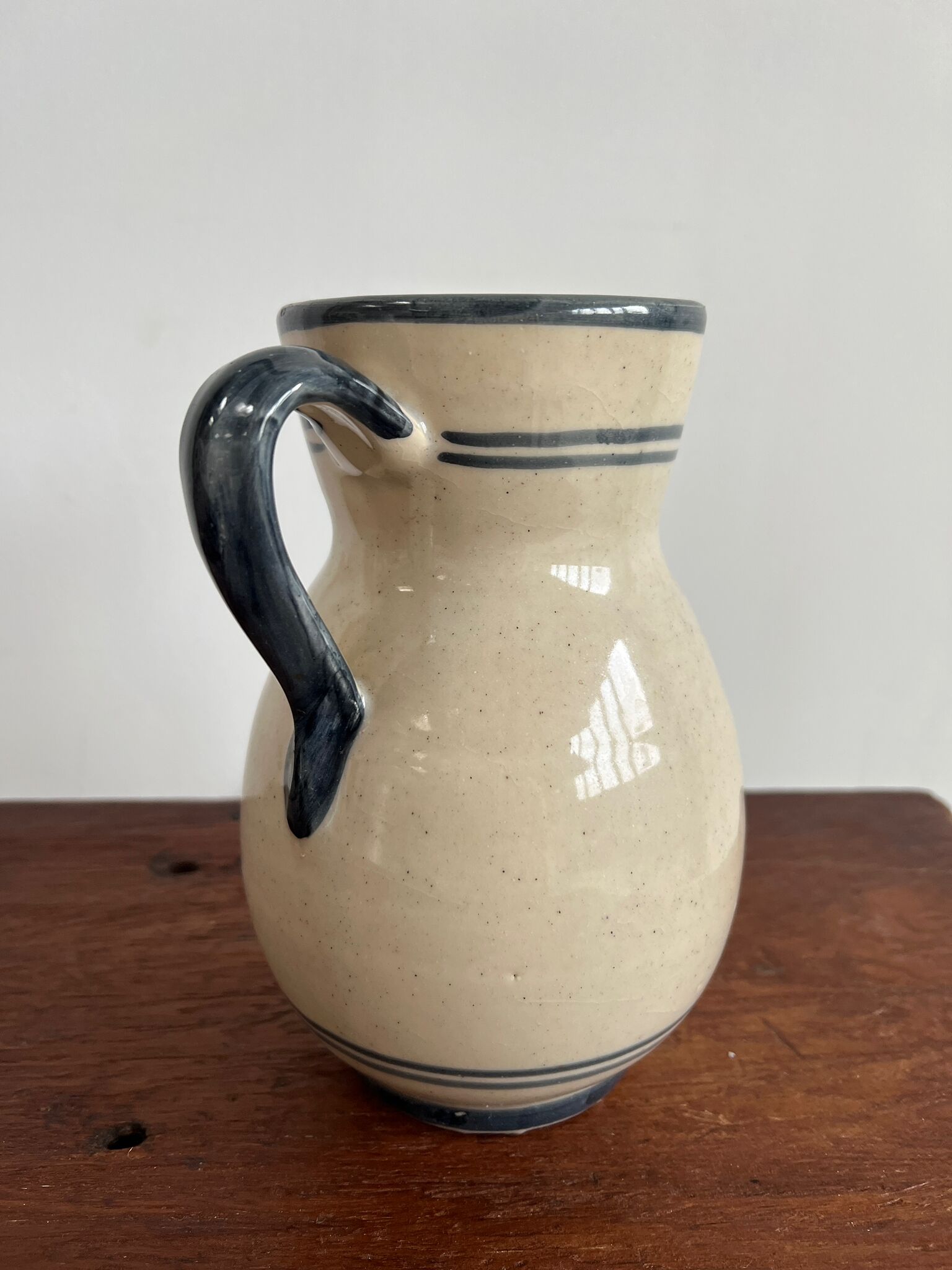 Off-white glossy ceramic decanter, hand-painted gray blue patterns H:20cm