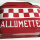Former Art Deco matchbox in sheet metal enamelled with red and white tiles
