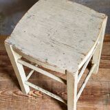 Old patinated painted wooden stool