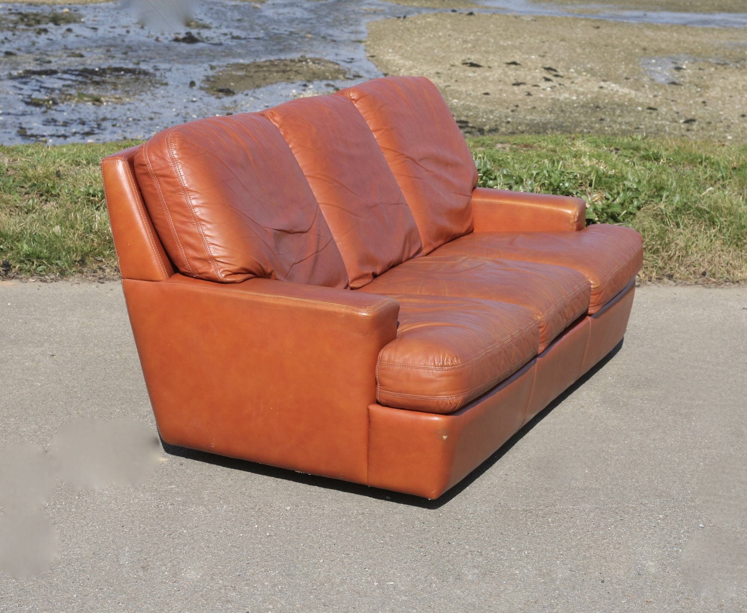 Space age sofa. Tan leather. Circa 1970