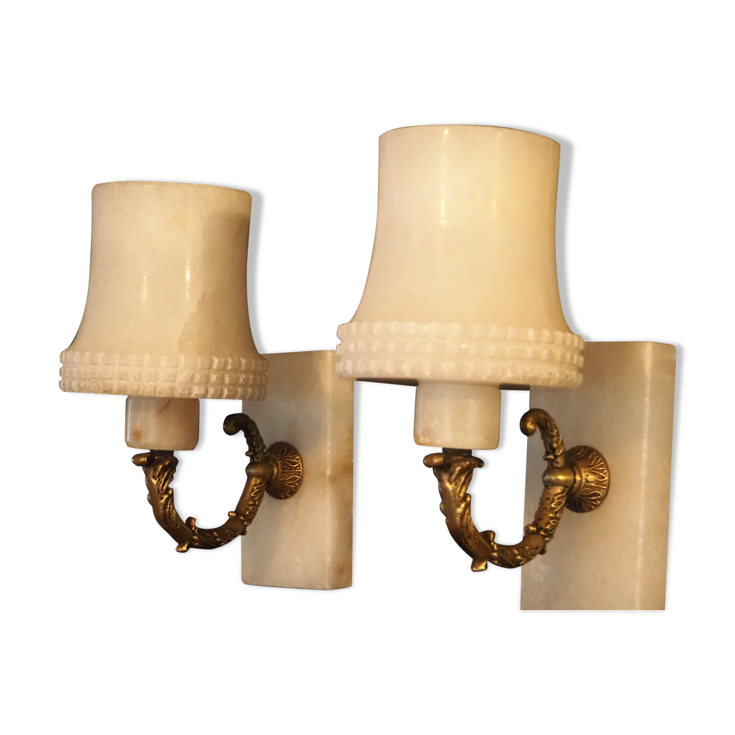 Pair of curved alabaster and bronze appliques