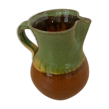 Green and brown ceramic pitcher