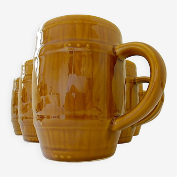 Suite of six earthenware beer mugs imitating the shape of a barrel