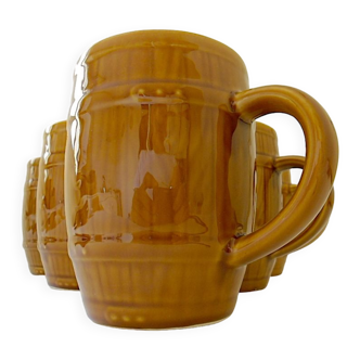 Suite of six earthenware beer mugs imitating the shape of a barrel