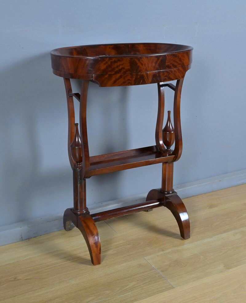 Mahogany burl catch-all table, Empire period – early 19th century