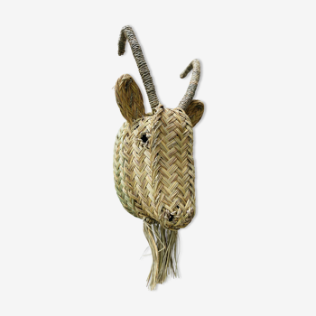 Trophy animal head in palm leaves - Buffalo
