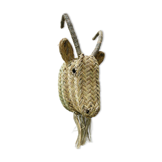 Trophy animal head in palm leaves - Buffalo