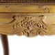 Armchair in solid oak with caning and a central leg (known as couillard), 89x68cm.