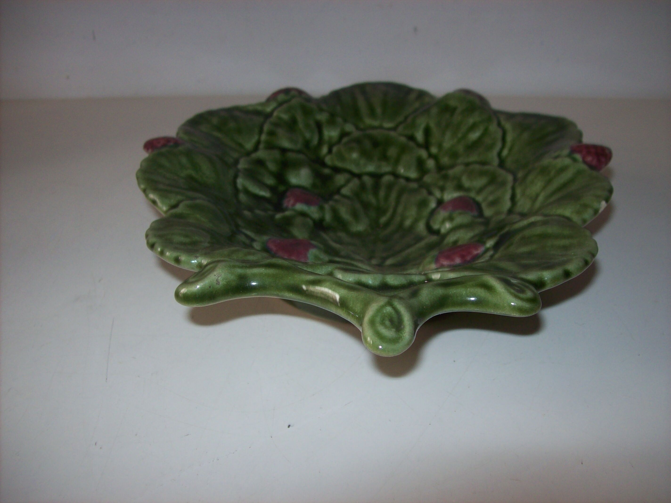 Tidy with raspberry decoration