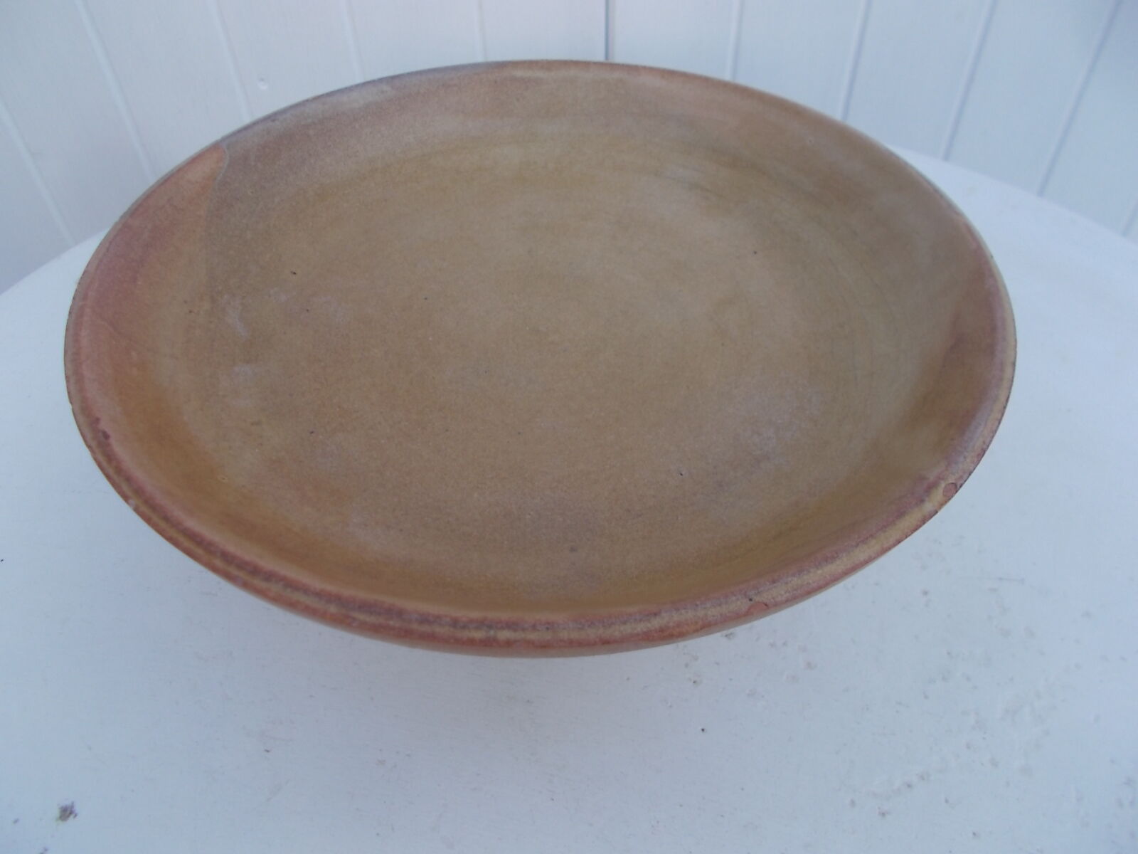 Stoneware serving dish for fruit.