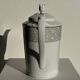 Bavarian porcelain teapot from Germany with blue frieze and flower lid H23
