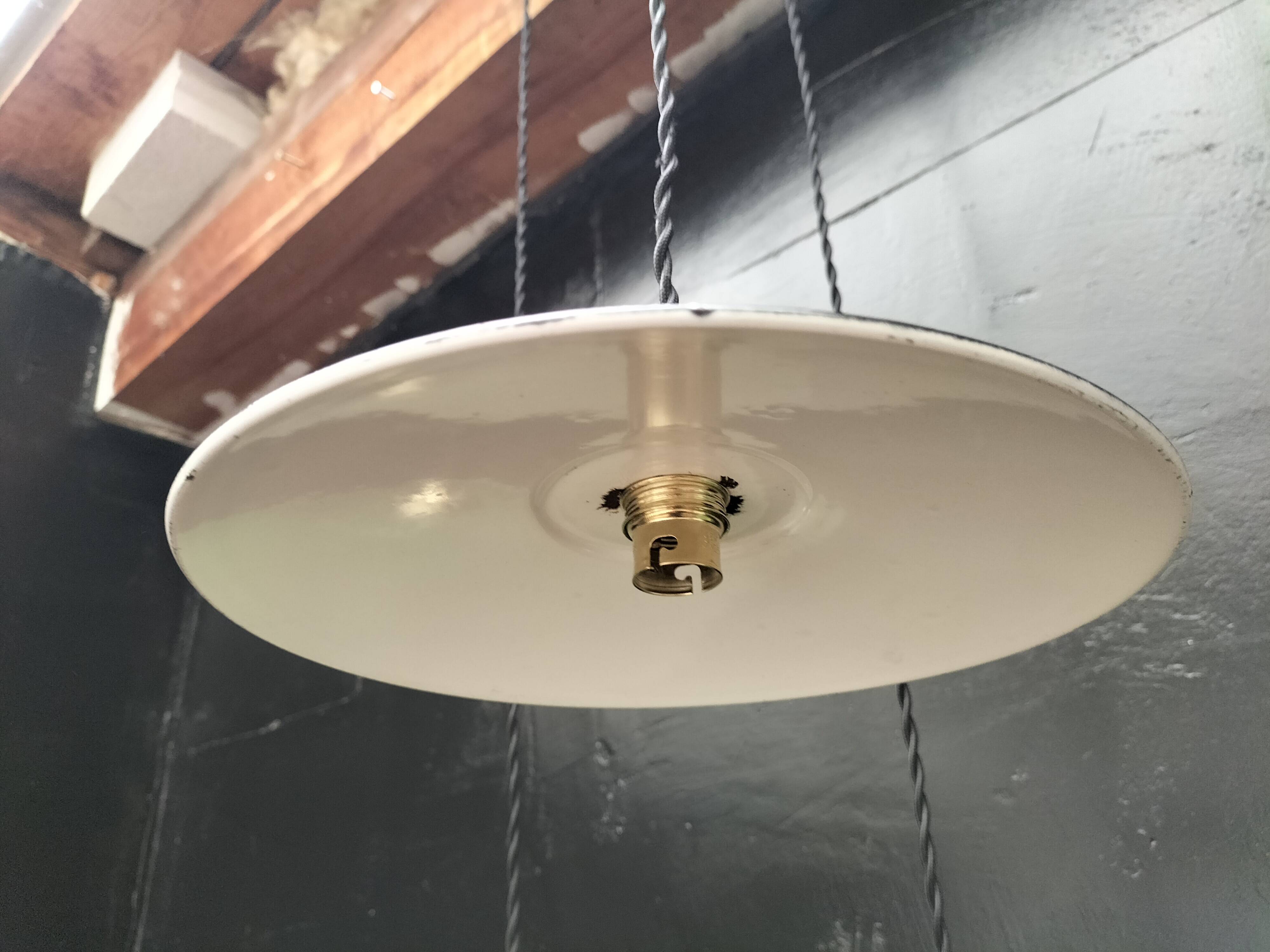 4 enameled sheet metal pendants