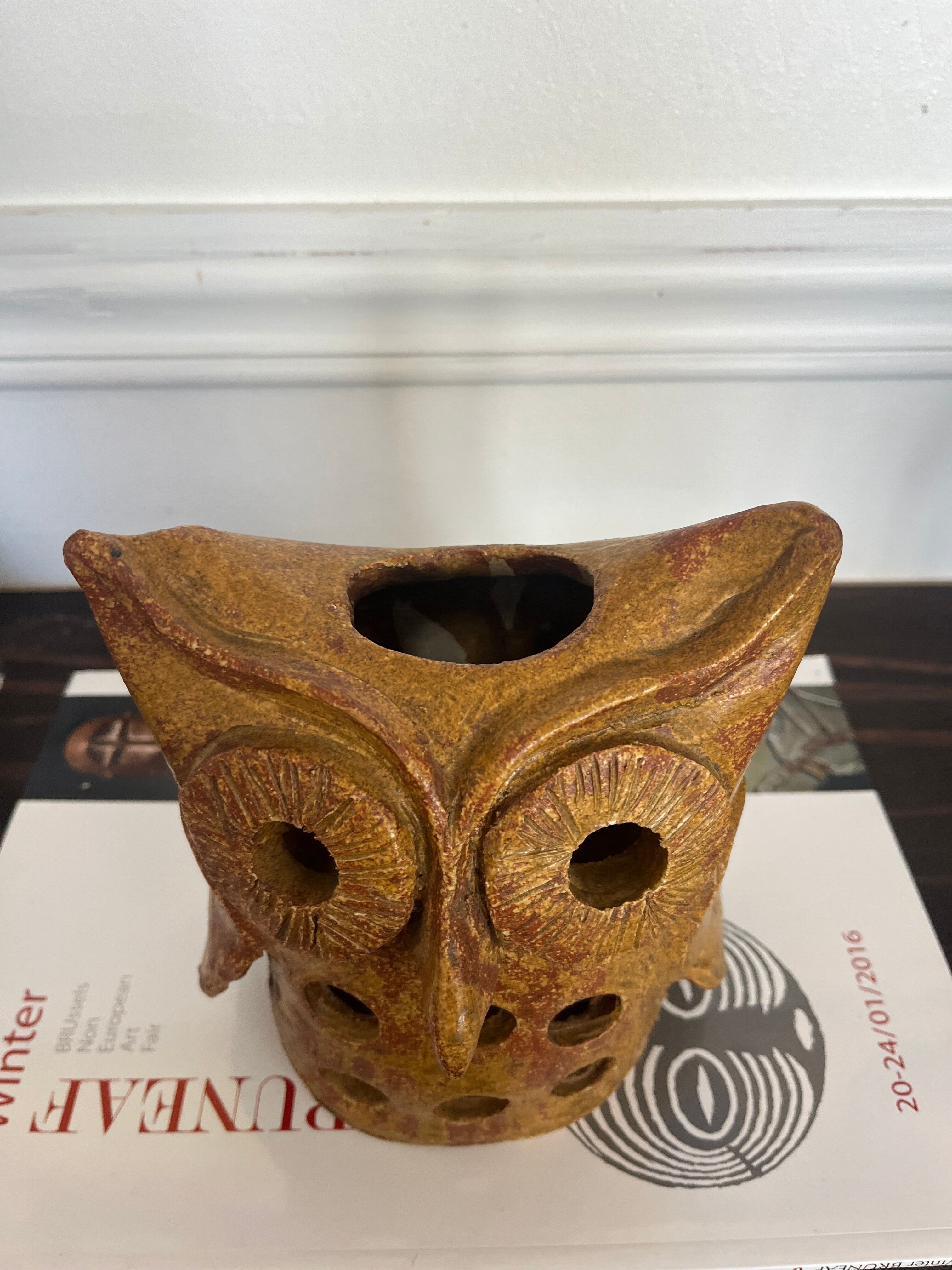 Stoneware lantern in the shape of an owl.