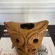 Stoneware lantern in the shape of an owl.